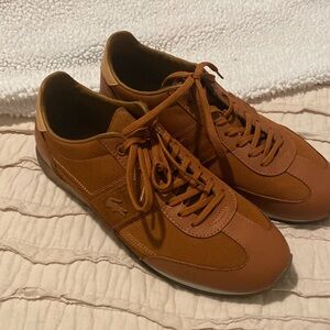 Lacoste Like NEW! tan leather shoes. Size 9.5 US Like new.